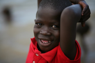 A happy Child with Cherish Uganda