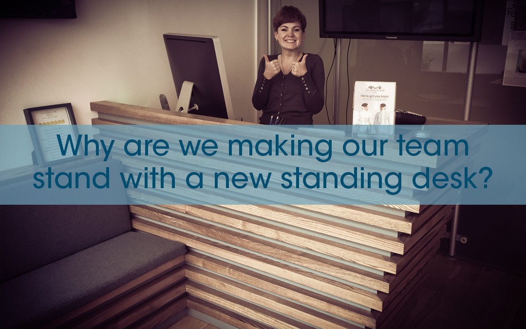 Why are we making our team stand with a new standing desk?